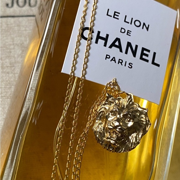 Vintage lion’s head necklace on a 20” gold plated Sterling silver chain